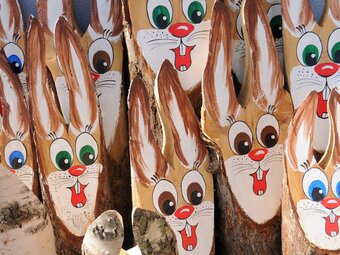 Colorful wooden Easter bunnies at the Easter bunny fair in Fischbach in Eastern Styria